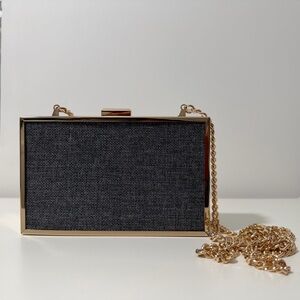 Elegant Grey Cloth Clutch Bag with Golden Frame